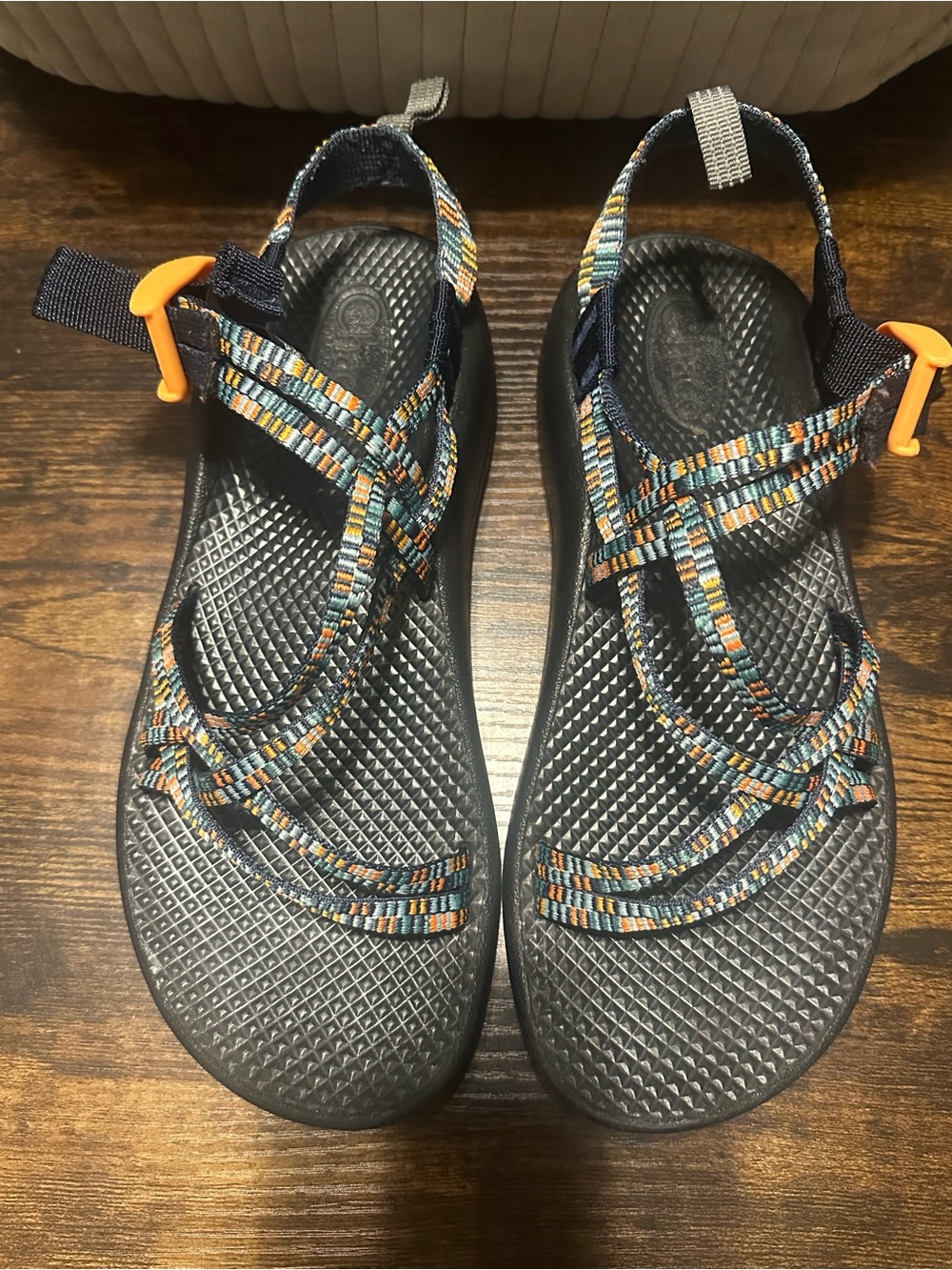 Chaco women’s Navy Multi-Striped Webbing Sandals with Orange Accents